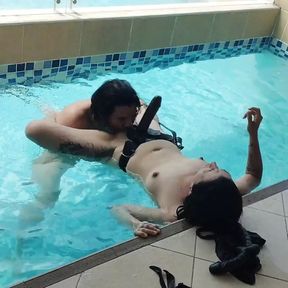 woman fucks man in the ass with strap-on in the pool ass sucking PEGGING