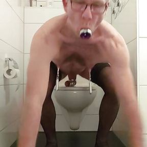 sharp nipple clamps on the toilet