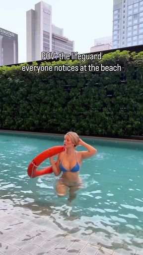 Woman in pool with floatie
