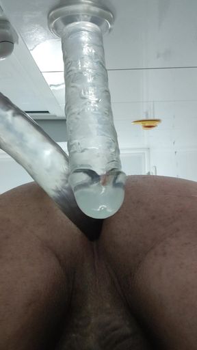 two dildos and a butt plug