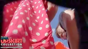 Wind has blown and uncovered the turning on details of the babes butt cheeks up skirt