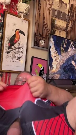 Giant Man in Wrestling Uniform Has Massive Release Hands Free