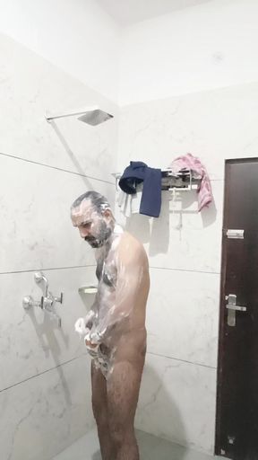 Indian young man naked man take shower in hotal