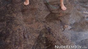 Pretty lady with petite body poses wonderfully at the beach