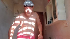 Nude boy in bathroom