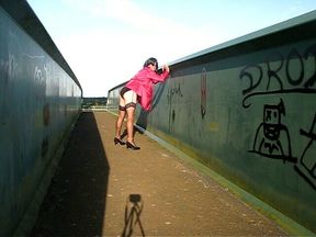 In the pink on a bridge