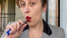 Goddess D Businesswoman with Hair Up Smoking More 120 in Coat and Red Lipstick