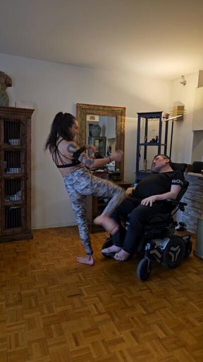 Kicking my dog in His wheelchair