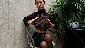 Topless Busty Asian Enjoys Her Cigarette Outdoors