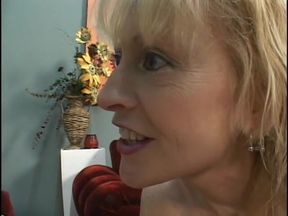 Mature blonde's pussy licked by younger blonde