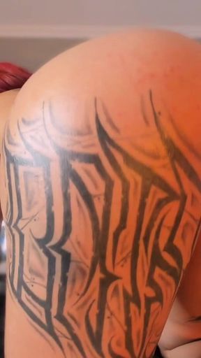 Latina Shakes Her Tattooed Butt
