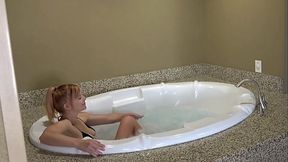 Kesha Looking playtime in a Jacuzzi solo
