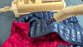 Vacuuming girlfriend's light down jacket with vintage electrolux