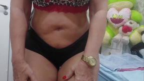 Dance sensually in shorts, getting naked and shaking your ass