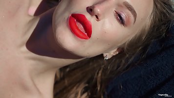 Aislin is a delicious blonde babe who likes to masturbate next to the swimming pool