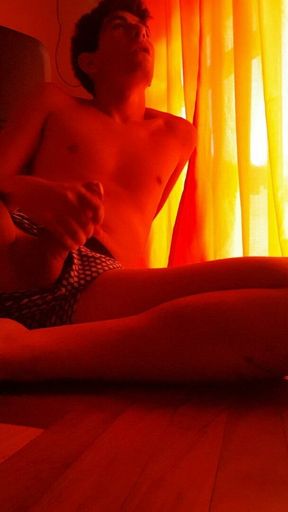 Subdued erotic light hints at handjob