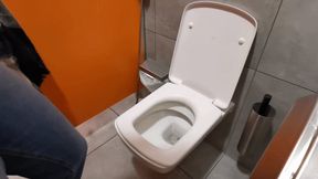 Groaning in public toilet while high traffic