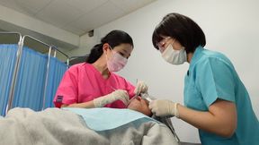 Asian Nezumiko dental hygienist gives me a dental treatment and a hand job