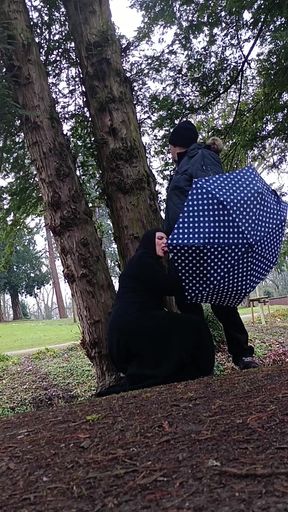 Muslim woman plays and blows a large cock outside in the park   Clip 2