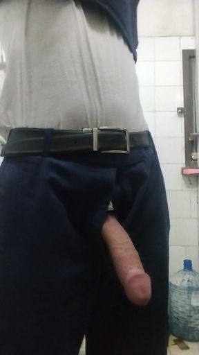 This video is of a village boy enjoying himself in the washroom with his hands.