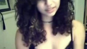 Fabulous young latina brunette with curly hair shows her ass nude