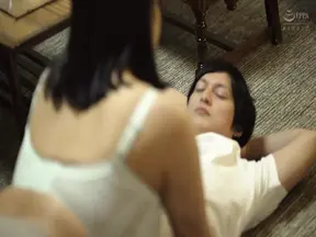 Mature woman with big breasts and black hair enjoys forbidden pleasure