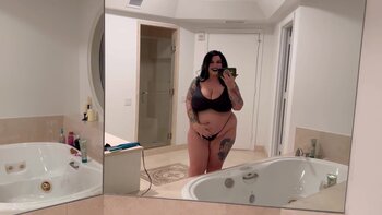 Gothic Goddess Marilyn Mayson Teases with Her Stunning BBW Curves