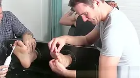 Two Freaks Have Kinky Feet Play With A Tied Up Gay Hunk