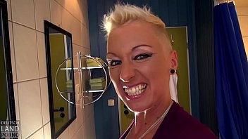 German babe Mandy Mistery shows off her assets