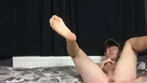 TXXXMStudios.com: British Rory Jackson jerking uncut dick and fun with toys in the bed