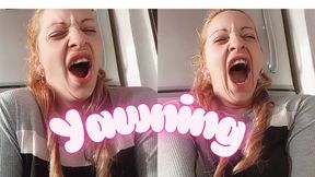Yawning very tired