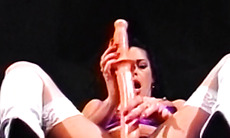 Gorgeous lesbian strips down and impales her pussy and ass