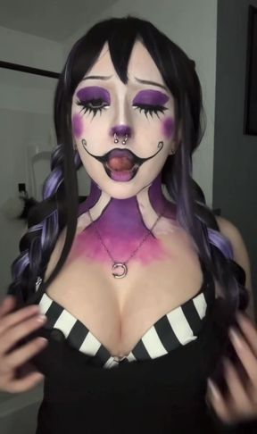 Purple and black clown makeup