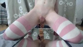 Crossdresser rides dildo