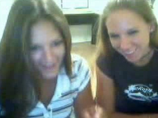 Two young college chicks from the girls dorm give lesbo show on webcam