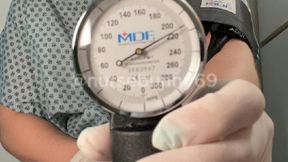 Self BP Cuff and Black Stethoscope Stimulation Testing in Patient Gown with Vibrator 1080p