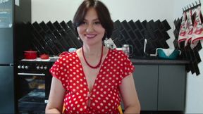her polka-dot dress spread to the sides