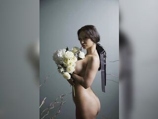 Monika Fox Undressed With Flowers Behind A Veil
