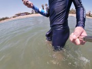 Surfer gets erect in his lycra for the pleasure of the people