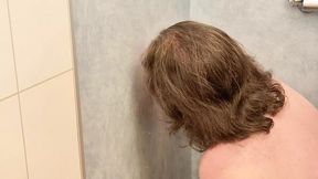 amateur sucks dildo in the shower