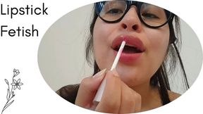 Painting my lips with gloss