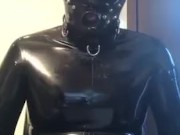 Full rubber gimp drools and wanks