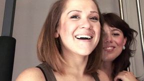 mila and mishy play with a strap on dildo and fuck each other with it