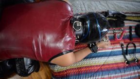 Latex Mistress DominaFire punishing her Latex Slave Girl