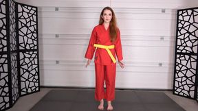 JACKIE EARNS HER ORANGE BELT