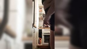 stepmom in tight shorts cooks in kitchen with sensual moves