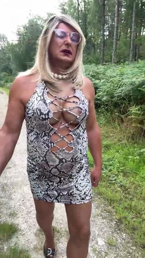 Sexy Crossdresser kellycd2022 in white animal print and pantyhose enjoying an afternoon drive