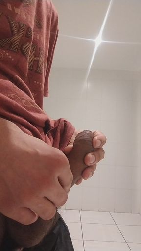 Cumshow in the Bathroom at Work