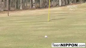 Cute Asian teen girls play a game of strip golf