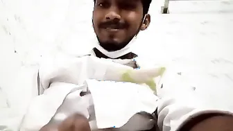 Indian twink strokes his big cock in locker room solo